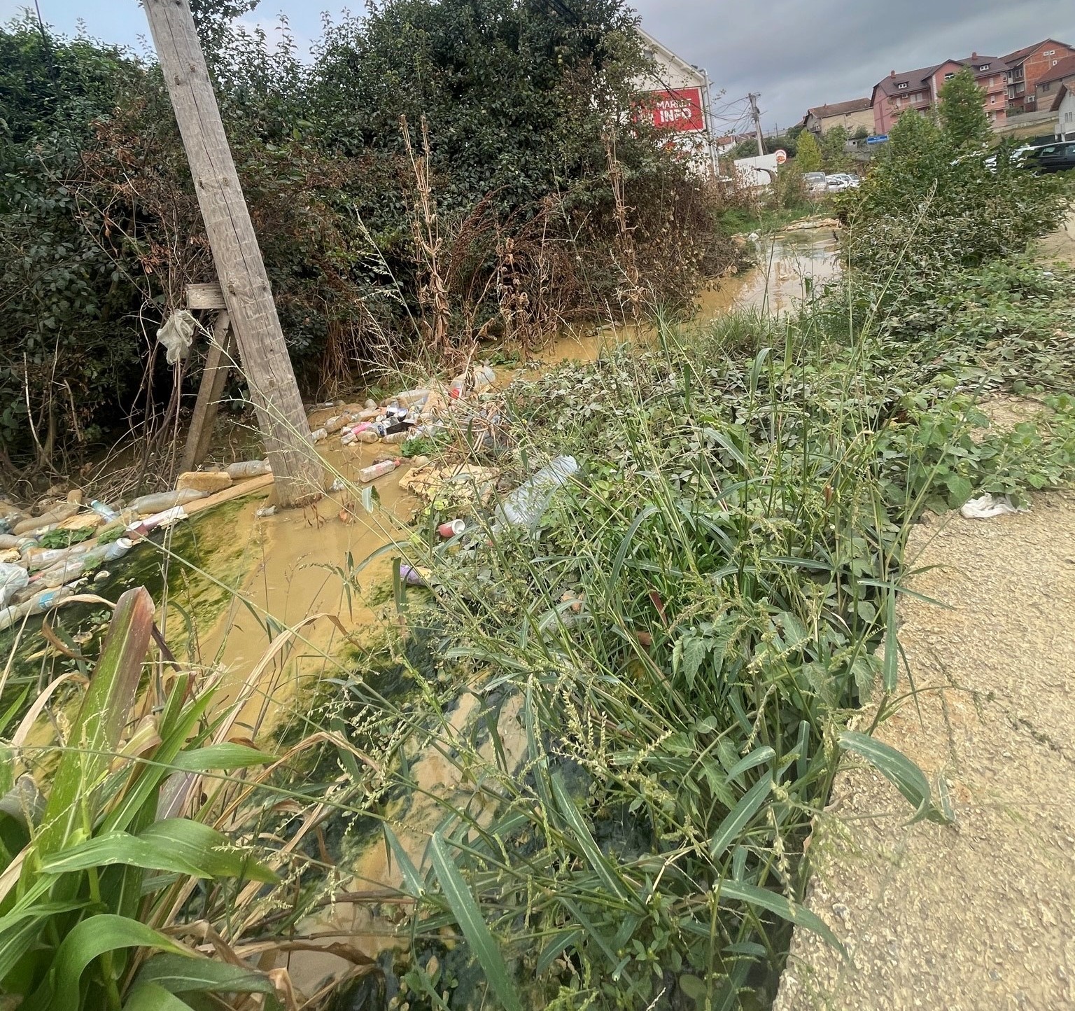 The problem with the open sewage system near the roundabout connecting Muharrem Fejza Street with C Street.